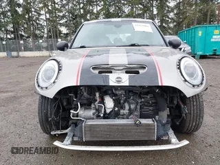 2017 MINI Hardtop 4 Door Cooper S z VIN WMWXU3C58H2D33073, wystawiony jako IAAI lot #41913081 z przebiegiem 51 631 mil mil oraz . Historia ofert i sprzedaży dostępna na DreamBid. Obrazek 6.