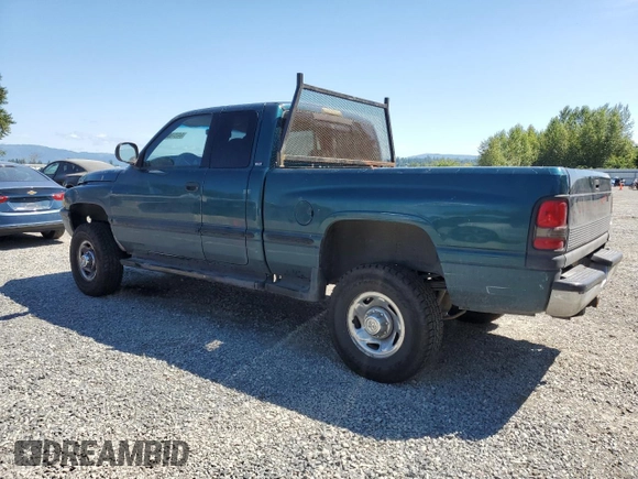 1999 Dodge 2500 with VIN 1B7KF23W2XJ539940, listed as a Copart auction lot 64237595 with 211,718 mi miles and Salvage title. Bid and sale history available at DreamBid. Image 2.