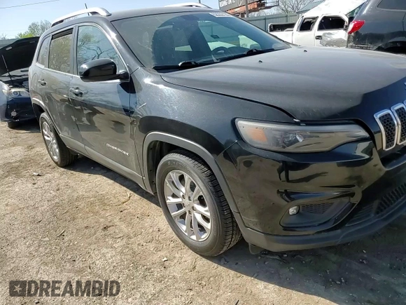 2019 Jeep Cherokee Latitude with VIN 1C4PJLCB2KD203283, listed as a Copart auction lot 52202135 with 140,809 mi miles and Salvage title. Bid and sale history available at DreamBid. Image 12.