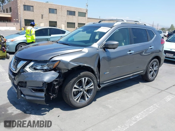 2017 Nissan Rogue SL Hybrid z VIN 5N1ET2MV9HC768242, wystawiony jako IAAI lot #42443514 z przebiegiem 84 879 mil mil oraz . Historia ofert i sprzedaży dostępna na DreamBid. Obrazek 17.