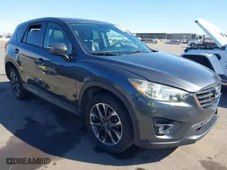 2016 Mazda CX-5 Grand Touring with VIN JM3KE2DYXG0649781, listed as a IAAI auction lot 41636329 with 83,433 mi miles. Bid and sale history available at carsss.com. Image 1.
