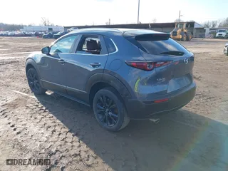 2022 Mazda CX-30 2.5 S Preferred Package with VIN 3MVDMBCL3NM422497, listed as a IAAI auction lot 41236220 with 57,752 mi miles. Bid and sale history available at carsss.com. Image 3.