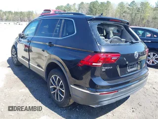 2020 Volkswagen Tiguan SE with VIN 3VV3B7AX1LM139519, listed as a IAAI auction lot 41890276 with 147,303 mi miles and . Bid and sale history available at DreamBid. Image 3.