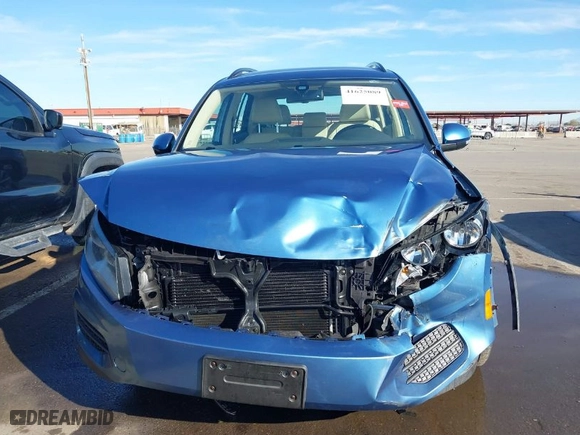 2017 Volkswagen Tiguan S with VIN WVGAV7AX1HW509822, listed as a IAAI auction lot 41625089 with 97,039 mi miles. Bid and sale history available at carsss.com. Image 6.