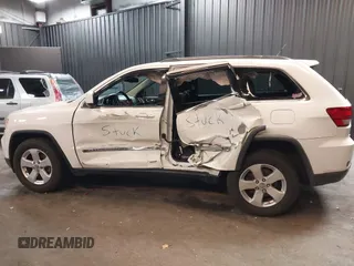 2013 Jeep Grand Cherokee Laredo with VIN 1C4RJFAG9DC532919, listed as a IAAI auction lot 40918828 with 140,093 mi miles. Bid and sale history available at carsss.com. Image 6.
