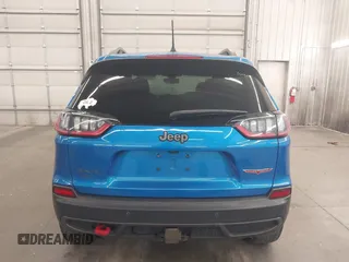 2020 Jeep Cherokee Trailhawk with VIN 1C4PJMBX6LD656570, listed as a IAAI auction lot 42399597 with 88,348 mi miles and . Bid and sale history available at DreamBid. Image 17.