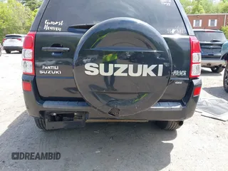 2013 Suzuki Grand Vitara Limited z VIN JS3TD0D7XD4100356, wystawiony jako IAAI lot #42250142 z przebiegiem 124 912 mil mil oraz . Historia ofert i sprzedaży dostępna na DreamBid. Obrazek 6.