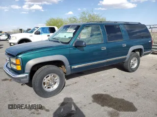 1997 GMC Suburban z VIN 3GKGK26J0VG522963, wystawiony jako Copart lot #56804105 z przebiegiem 297 544 mil mil oraz Tytuł czysty. Historia ofert i sprzedaży dostępna na DreamBid. Obrazek 1.