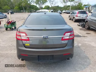 2018 Ford Taurus Limited z VIN 1FAHP2F8XJG129966, wystawiony jako IAAI lot #42319661 z przebiegiem 112 937 mil mil oraz . Historia ofert i sprzedaży dostępna na DreamBid. Obrazek 16.