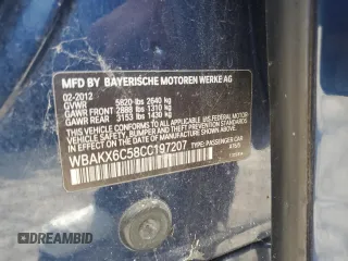 2012 BMW 7 Series with VIN WBAKX6C58CC197207, listed as a Copart auction lot 84153784 with 130,049 mi miles and Salvage title. Bid and sale history available at DreamBid. Image 12.
