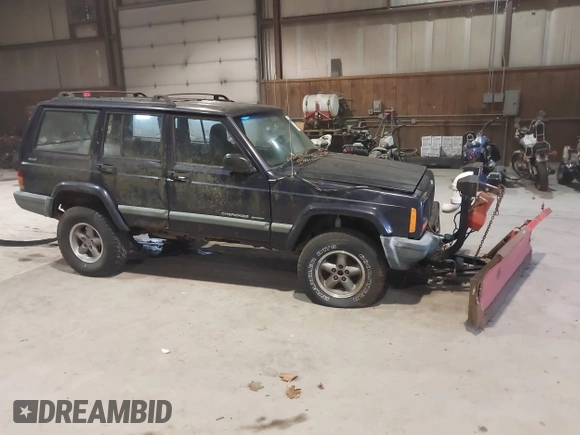 1999 Jeep Cherokee Sport with VIN 1J4FF68S2XL602709, listed as a IAAI auction lot 41177232 with Not Provided miles. Bid and sale history available at carsss.com. Image 1.