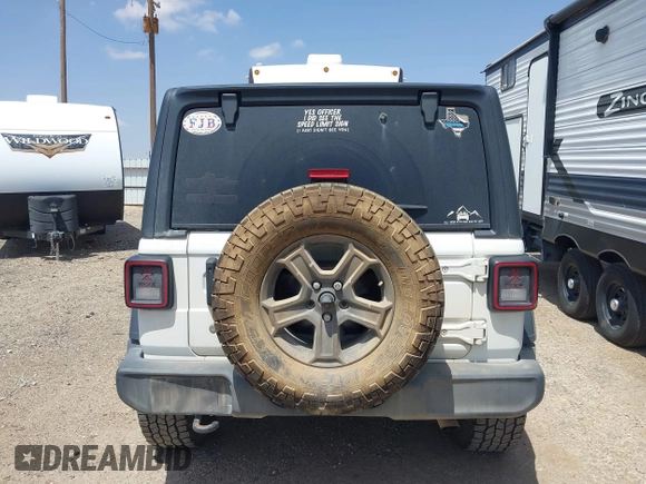 2018 Jeep Wrangler Unlimited Sport S with VIN 1C4HJXDG8JW127299, listed as a IAAI auction lot 42091561 with 116,082 mi miles and . Bid and sale history available at DreamBid. Image 16.