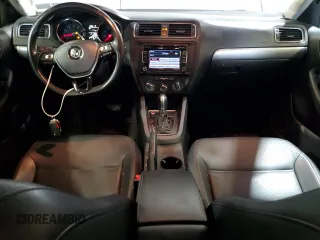 2015 Volkswagen Jetta SE with VIN 3VWD17AJ4FM308693, listed as a Copart auction lot 59987585 with 87,136 mi miles and Salvage title. Bid and sale history available at DreamBid. Image 8.