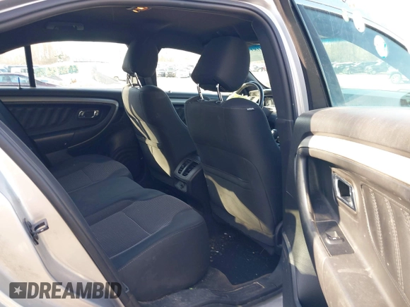 2013 Ford Taurus SEL with VIN 1FAHP2E8XDG191132, listed as a IAAI auction lot 41833542 with 165,125 mi miles. Bid and sale history available at carsss.com. Image 8.