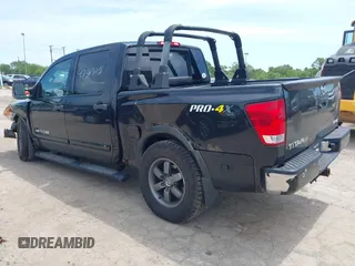 2013 Nissan Titan SV with VIN 1N6AA0EC4DN302479, listed as a IAAI auction lot 42383255 with 112,991 mi miles and . Bid and sale history available at DreamBid. Image 3.