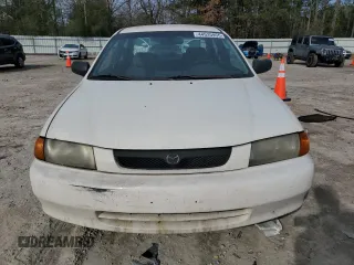 1998 Mazda Protege DX z VIN JM1BC1416W0194406, wystawiony jako Copart lot #44535955 z przebiegiem 312 942 mil mil oraz Szkoda całkowita • Salvage title. Historia ofert i sprzedaży dostępna na DreamBid. Obrazek 5.