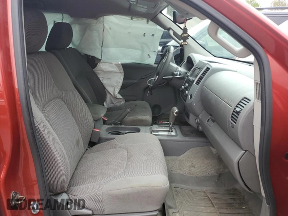 2015 Nissan Frontier SV with VIN 1N6AD0ER3FN717050, listed as a Copart auction lot 54595625 with 123,698 mi miles and Salvage title. Bid and sale history available at DreamBid. Image 7.