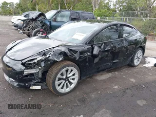 2023 Tesla Model 3 z VIN 5YJ3E1EA4PF433466, wystawiony jako IAAI lot #42249247 z przebiegiem 39 808 mil mil oraz . Historia ofert i sprzedaży dostępna na DreamBid. Obrazek 18.