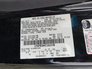 2014 Ford Mustang V6 with VIN 1ZVBP8EM4E5263548, listed as a IAAI auction lot 40331377 with 71,505 mi miles. Bid and sale history available at carsss.com. Image 9.