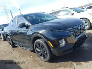 2023 Hyundai Santa Cruz Night Edition z VIN 5NTJCDAF2PH074217, wystawiony jako IAAI lot #41848065 z przebiegiem 14 000 mil mil oraz . Historia ofert i sprzedaży dostępna na DreamBid. Obrazek 1.