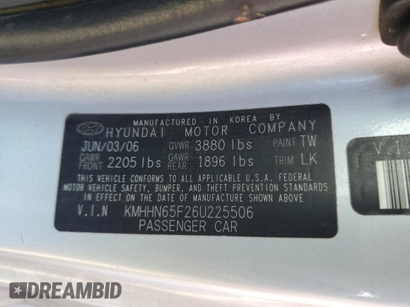 2006 Hyundai Tiburon GT z VIN KMHHN65F26U225506, wystawiony jako Copart lot #56997285 z przebiegiem 170 175 mil mil oraz Szkoda całkowita • Salvage title. Historia ofert i sprzedaży dostępna na DreamBid. Obrazek 13.