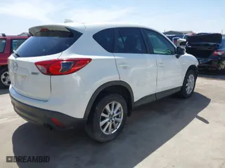 2014 Mazda CX-5 Touring with VIN JM3KE2CY2E0426164, listed as a IAAI auction lot 41812932 with 186,015 mi miles. Bid and sale history available at carsss.com. Image 4.