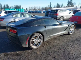 2014 Chevrolet Corvette Z51 3LT z VIN 1G1YM2D79E5121445, wystawiony jako IAAI lot #41652476 z przebiegiem 56 988 mil mil oraz . Historia ofert i sprzedaży dostępna na DreamBid. Obrazek 4.