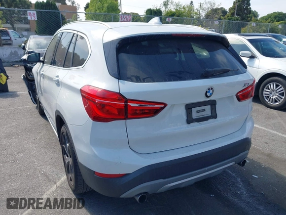 2018 BMW X1 xDrive28i with VIN WBXHT3C37J5K28375, listed as a IAAI auction lot 42039336 with 28,664 mi miles. Bid and sale history available at carsss.com. Image 3.