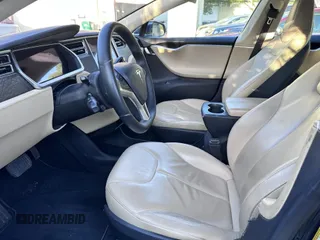 2013 Tesla Model S with VIN 5YJSA1DN8DFP17027, listed as a IAAI auction lot 42168317 with 148,394 mi miles. Bid and sale history available at carsss.com. Image 5.
