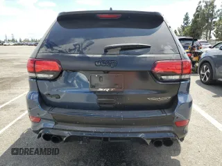 2020 Jeep Grand Cherokee Trackhawk z VIN 1C4RJFN94LC314087, wystawiony jako Copart lot #51484835 z przebiegiem 38 306 mil mil oraz Szkoda całkowita • Salvage title. Historia ofert i sprzedaży dostępna na DreamBid. Obrazek 6.