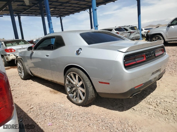 2021 Dodge Challenger SXT with VIN 2C3CDZGG4MH607520, listed as a Copart auction lot 50840955 with 57,635 mi miles and Salvage Title. Bid and sale history available at carsss.com. Image 2.