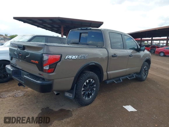 2021 Nissan Titan Pro-4X with VIN 1N6AA1ED9MN519749, listed as a IAAI auction lot 41948962 with 65,807 mi miles and . Bid and sale history available at DreamBid. Image 4.