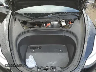 2019 Tesla Model 3 Mid Range with VIN 5YJ3E1EA1KF397390, listed as a Copart auction lot 49862915 with 63,698 mi miles and Salvage Title. Bid and sale history available at carsss.com. Image 11.