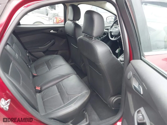 2015 Ford Focus Titanium with VIN 1FADP3N23FL248880, listed as a IAAI auction lot 41474936 with 86,245 mi miles. Bid and sale history available at carsss.com. Image 8.