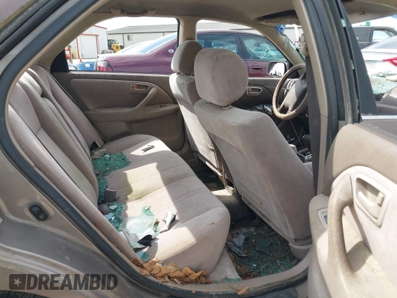1999 Toyota Camry LE z VIN JT2BF28K9X0216439, wystawiony jako IAAI lot #42213626 z przebiegiem 280 812 mil mil oraz . Historia ofert i sprzedaży dostępna na DreamBid. Obrazek 8.
