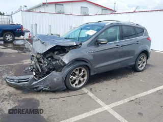 2013 Ford Escape Titanium with VIN 1FMCU9J95DUC95061, listed as a IAAI auction lot 42293047 with 124,641 mi miles and . Bid and sale history available at DreamBid. Image 2.