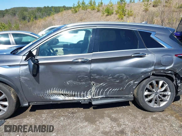 2020 Infiniti QX50 Essential with VIN 3PCAJ5M1XLF101179, listed as a IAAI auction lot 41761070 with 76,662 mi miles and . Bid and sale history available at DreamBid. Image 14.