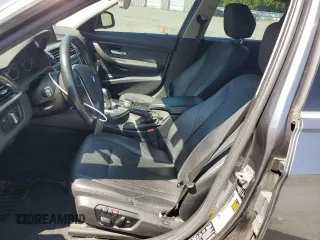 2015 BMW 3 Series 328i xDrive with VIN WBA3B3C5XFJ985147, listed as a Copart auction lot 59819905 with 113,492 mi miles and Salvage title. Bid and sale history available at DreamBid. Image 7.