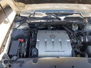2004 Cadillac DeVille z VIN 1G6KD54Y74U129218, wystawiony jako IAAI lot #41786756 z przebiegiem 167 125 mil mil oraz . Historia ofert i sprzedaży dostępna na DreamBid. Obrazek 10.