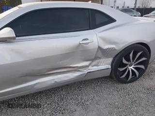 2014 Chevrolet Camaro LT z VIN 2G1FC1E36E9259754, wystawiony jako IAAI lot #41864556 z przebiegiem 118 443 mil mil oraz . Historia ofert i sprzedaży dostępna na DreamBid. Obrazek 6.