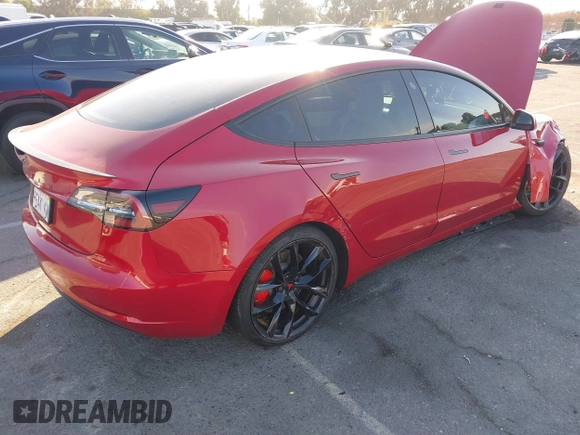 2021 Tesla Model 3 Performance with VIN 5YJ3E1EC9MF926301, listed as a IAAI auction lot 40959721 with 28,094 mi miles and . Bid and sale history available at DreamBid. Image 4.