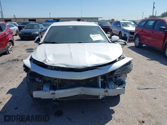2018 Chevrolet Impala LT with VIN 1G1105S34JU106107, listed as a IAAI auction lot 41871693 with 111,412 mi miles and . Bid and sale history available at DreamBid. Image 12.