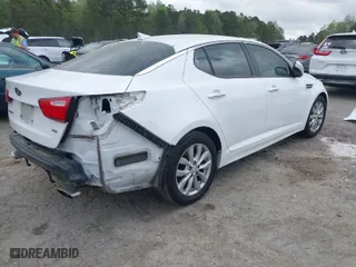 2015 Kia Optima LX with VIN 5XXGM4A73FG443157, listed as a IAAI auction lot 41910397 with 193,045 mi miles. Bid and sale history available at carsss.com. Image 4.