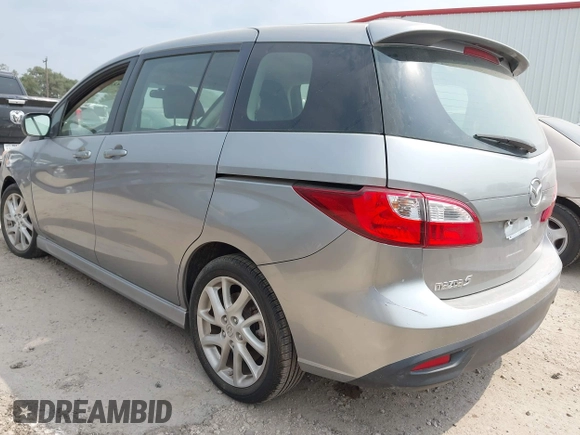 2012 Mazda 5 Grand Touring z VIN JM1CW2DL1C0126545, wystawiony jako IAAI lot #42301130 z przebiegiem 151 212 mil mil oraz . Historia ofert i sprzedaży dostępna na DreamBid. Obrazek 3.