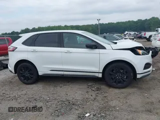 2023 Ford Edge SE z VIN 2FMPK4G95PBA49168, wystawiony jako IAAI lot #42403184 z przebiegiem 41 448 mil mil oraz . Historia ofert i sprzedaży dostępna na DreamBid. Obrazek 14.