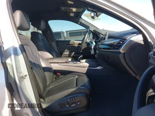 2018 BMW X6 xDrive35i with VIN 5UXKU2C50J0X51275, listed as a IAAI auction lot 41421704 with 165,052 mi miles. Bid and sale history available at carsss.com. Image 5.