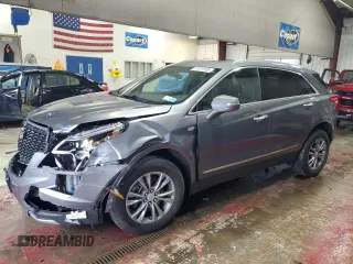 2021 Cadillac XT5 AWD Premium Luxury with VIN 1GYKNDRS0MZ154578, listed as a Copart auction lot 51579185 with 55,591 mi miles and Salvage Title. Bid and sale history available at carsss.com. Image 1.