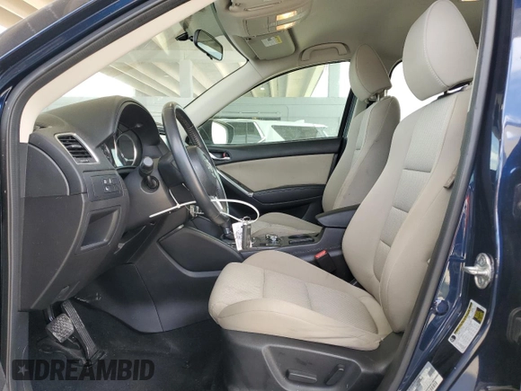 2016 Mazda CX-5 Touring with VIN JM3KE2CY9G0834048, listed as a Copart auction lot 54491535 with 116,328 mi miles and Salvage Title. Bid and sale history available at DreamBid. Image 7.