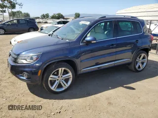 2015 Volkswagen Tiguan SE with VIN WVGAV7AX2FW094359, listed as a Copart auction lot 60101885 with 106,305 mi miles and Salvage title. Bid and sale history available at DreamBid. Image 1.