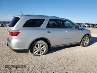 2013 Dodge Durango Crew with VIN 1C4SDHDT0DC590172, listed as a Copart auction lot 80140034 with 135,078 mi miles and Salvage title. Bid and sale history available at DreamBid. Image 3.